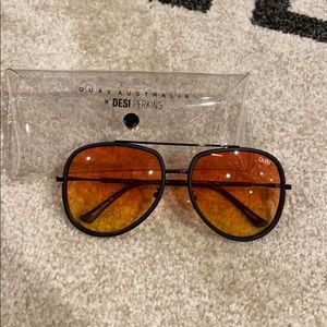 Quay sunglasses, case is different but mint.